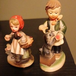 Vintage goebel hummel boy and girl